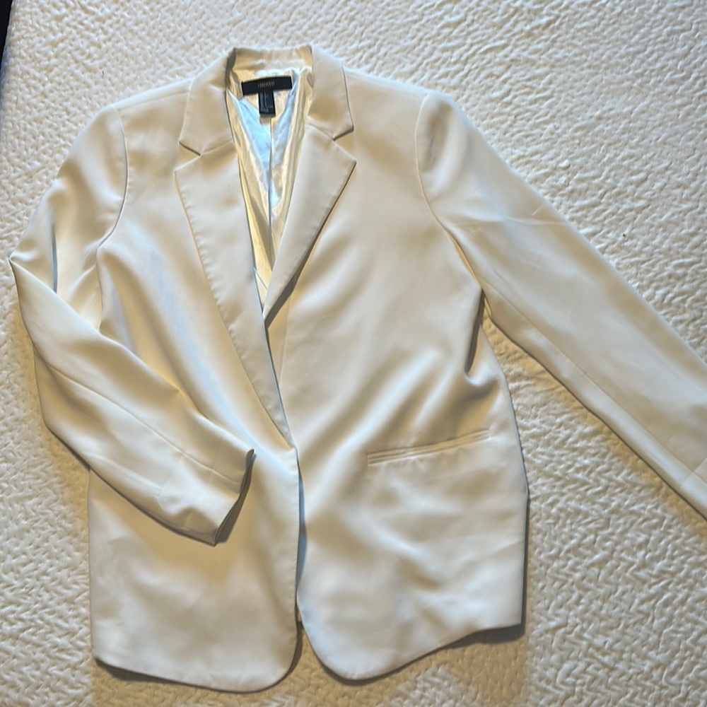 White Womens blazer.